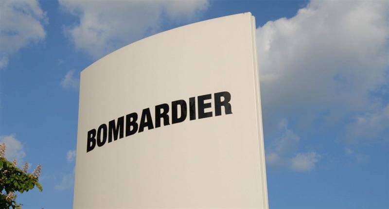 Bombardier tops revenue, but profit falls